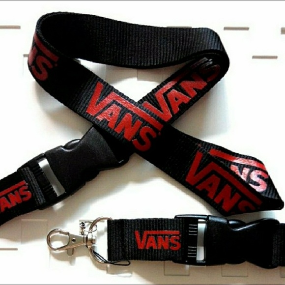 red and black strap vans